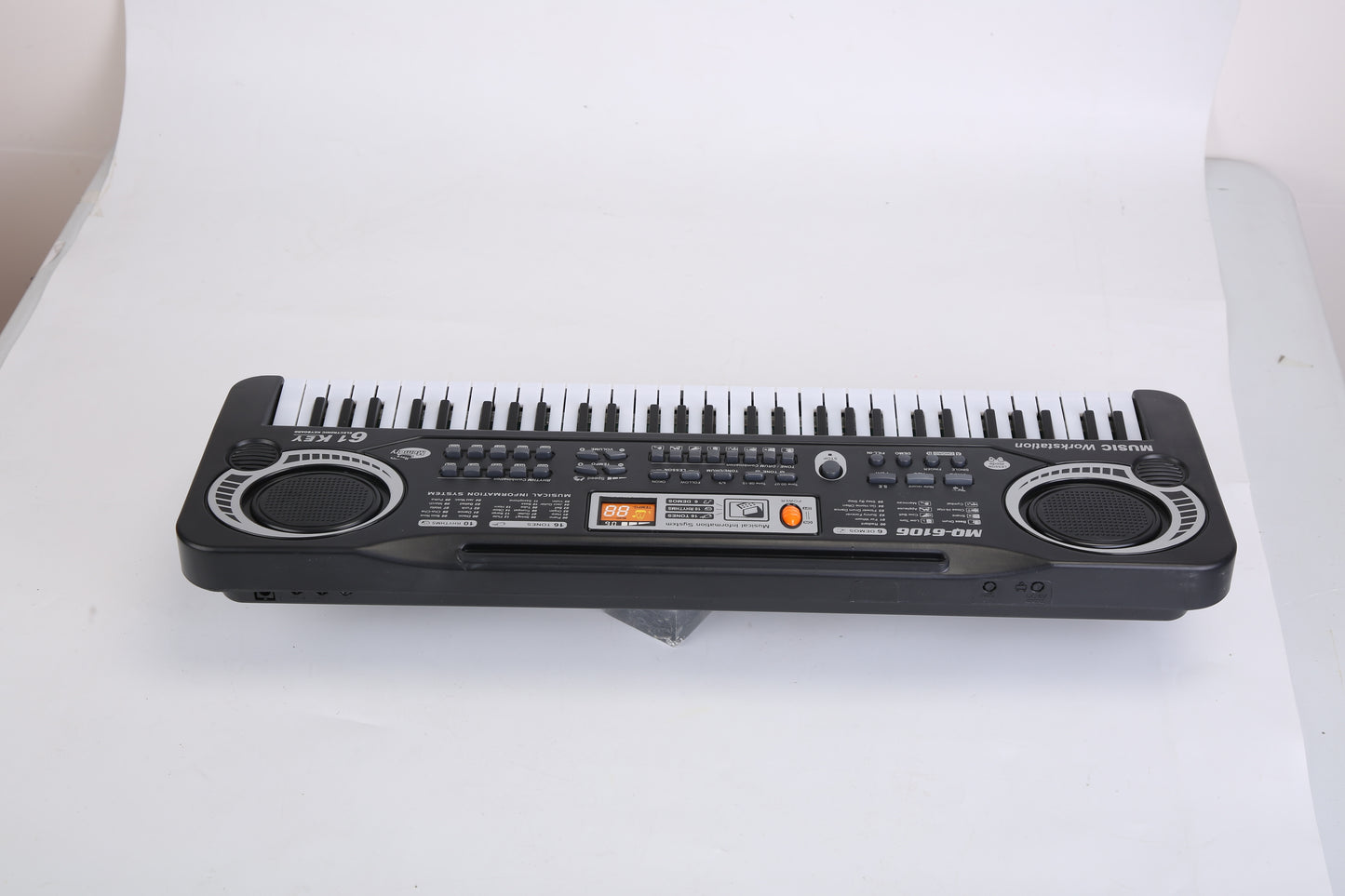 Electronic keyboard on a white surface