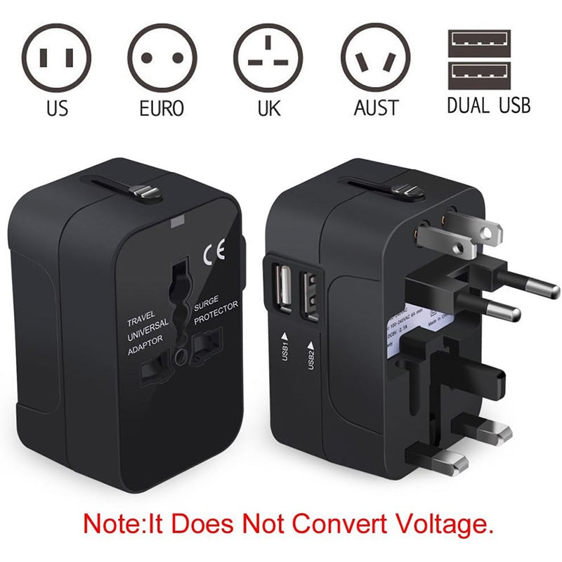 Black travel adapter with multiple plug sockets and USB ports on a white background.