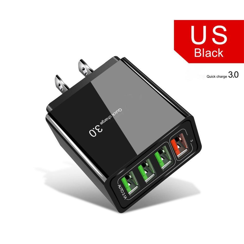 Black USB charger with four ports on a white background