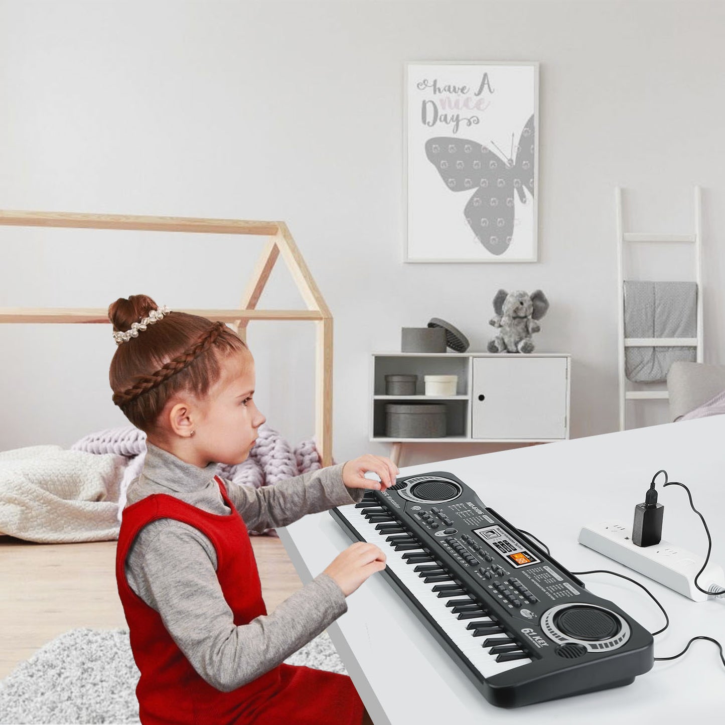 Child playing a keyboard in a bedroom with a butterfly decoration on the wall.
