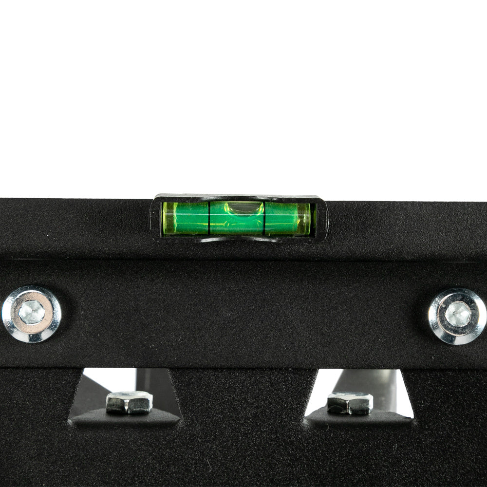 Black metal bracket with a green laser level on a white background