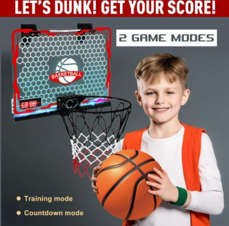 Child holding a basketball with a basketball hoop and digital display in the background, promotional text above.