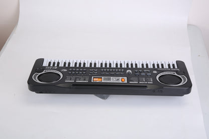 Electronic keyboard on a white surface