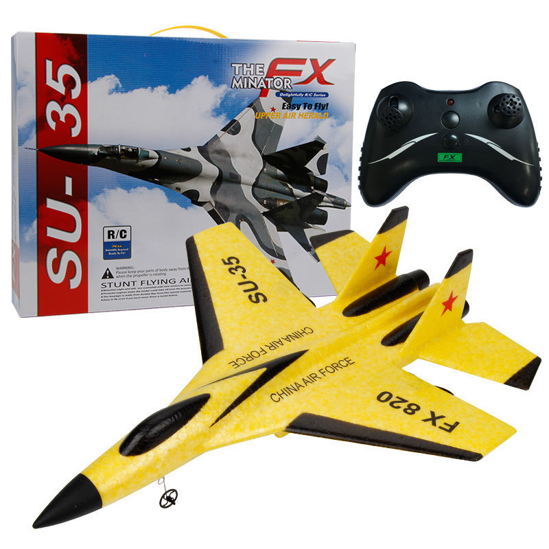 A set of fixed-wing educational toys, including a yellow and black remote-controlled aircraft and its packaging box with graphic design and text.