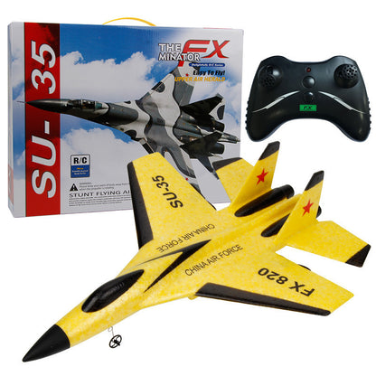 A set of fixed-wing educational toys, including a yellow and black remote-controlled aircraft and its packaging box with graphic design and text.