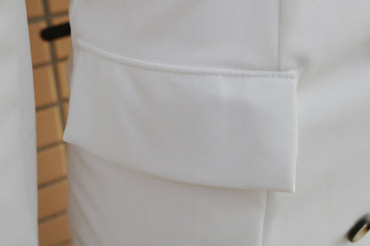 Off-the-shoulder long-sleeved beige dress