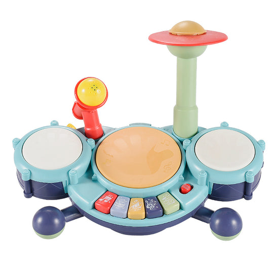Colorful toy drum set with various buttons on a white background
