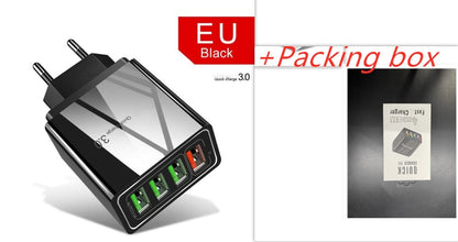 Black four-port USB charger with packaging box on a white background