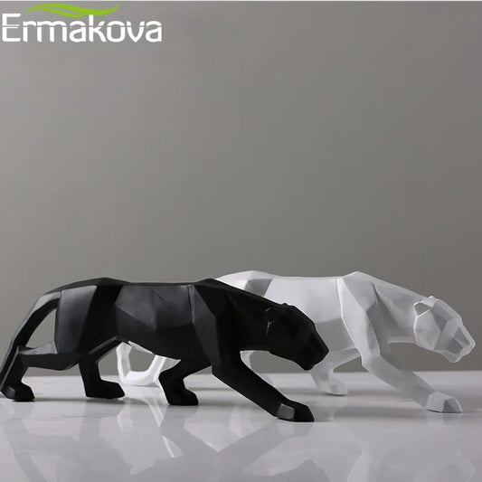 Two resin sculptures of panthers, one in black and one in white, with a geometric style.